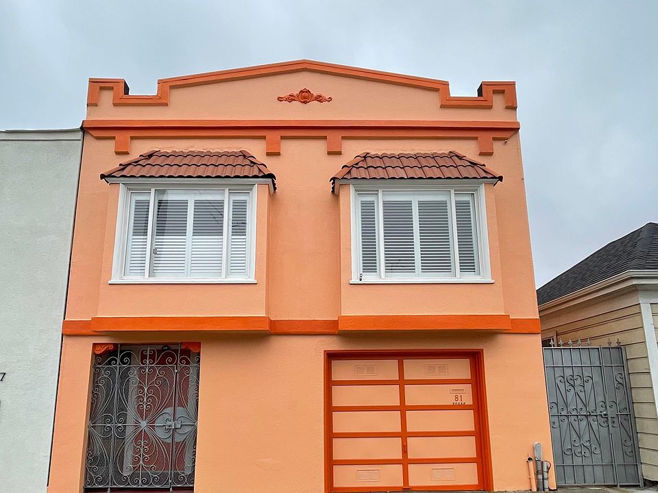 Front view of the house with side gate entrance
