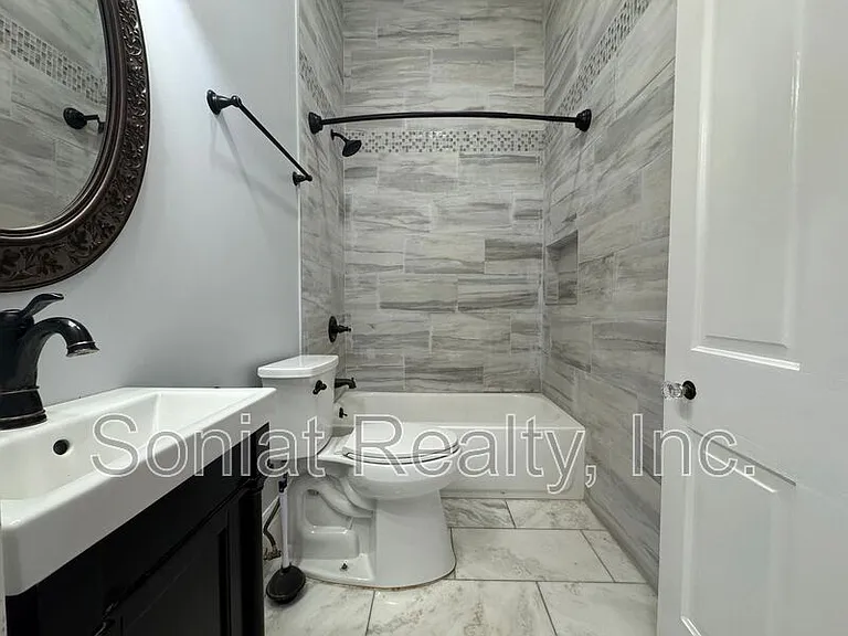 3118 Urquhart St — Photo 5