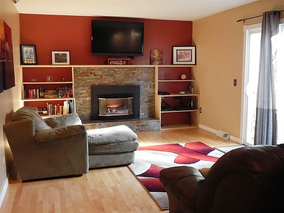 Family room with new glass sliding doors leading to back yard deck.