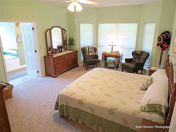 Master suite with double doors leading to