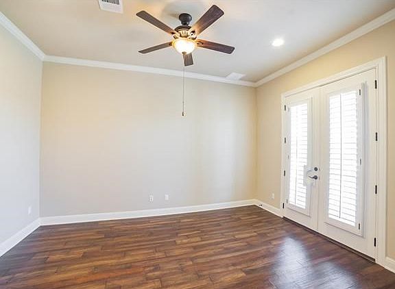 This beautiful room with hardwood flooring and exterior entry is perfect for your home office!
