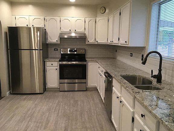 All new granite counters, tile floor and stainless appliance