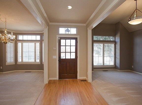 Entry Opens to Formal Living and Dining