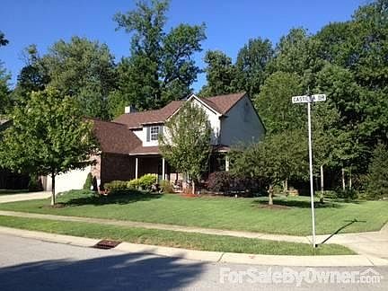 Corner View
						:
						Home is surrounded by mature trees and sits on a low traffic corner lot.