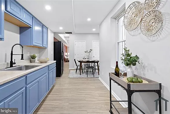 404 N Patterson Park Ave — Photo 1