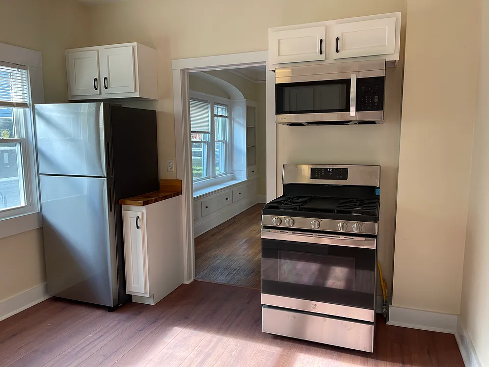Brand new fridge and gas range.