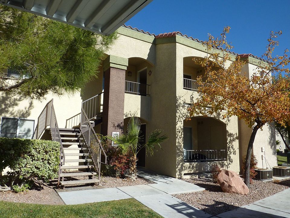 Wood Stucco structure, tile roof are shown here. Upper balcony is to this unit