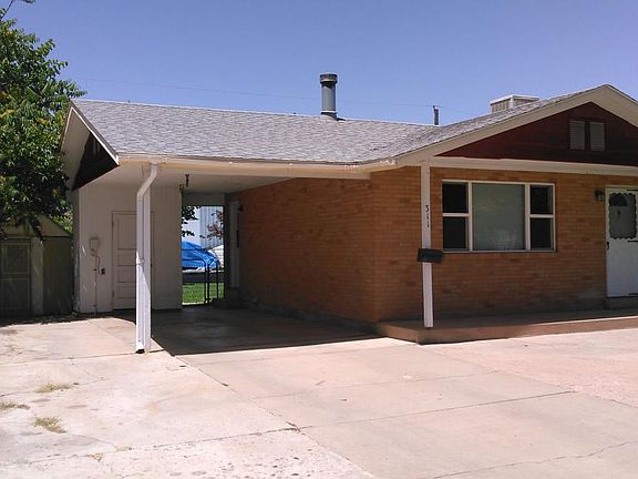 Car port and driveway