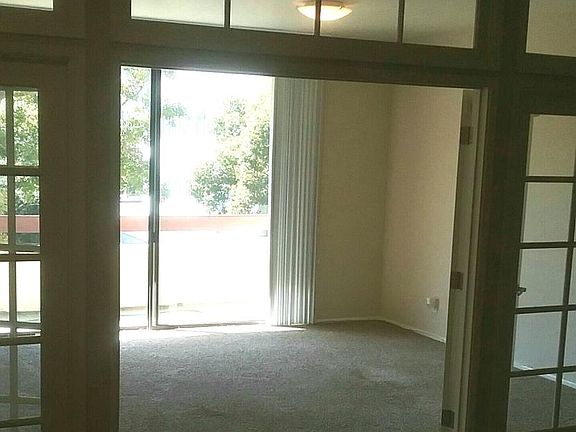 Living room looking into adjacent area