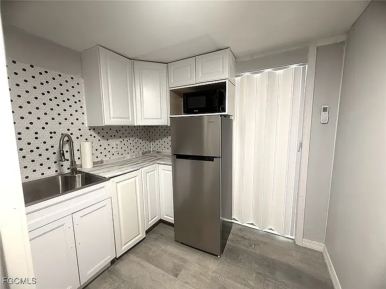 8239 Suncoast Dr — Photo 9