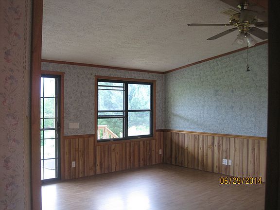Family room with sliding glass doors to front porch