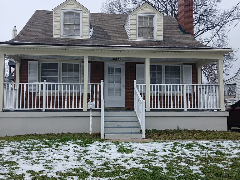 3303 Hikes Ln — Photo 1