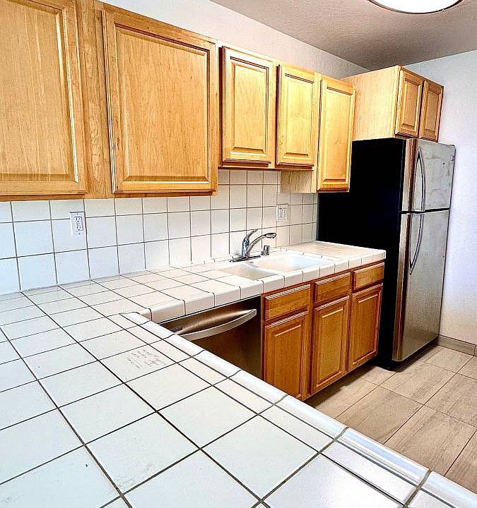 Unit #305 kitchen with stainless steel appliances