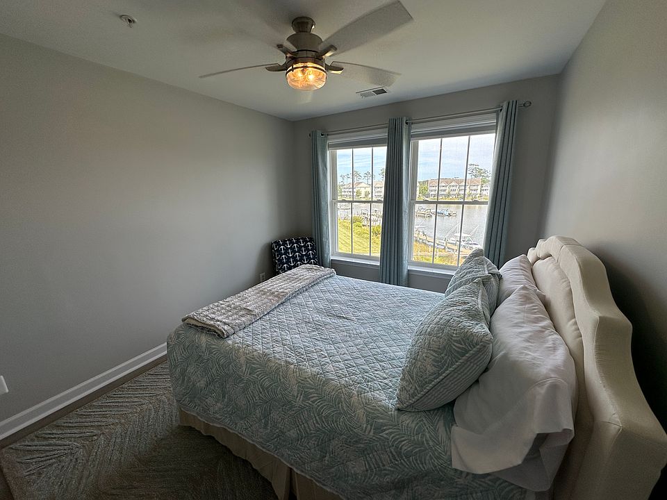 One of the three bedrooms that overlook the marina