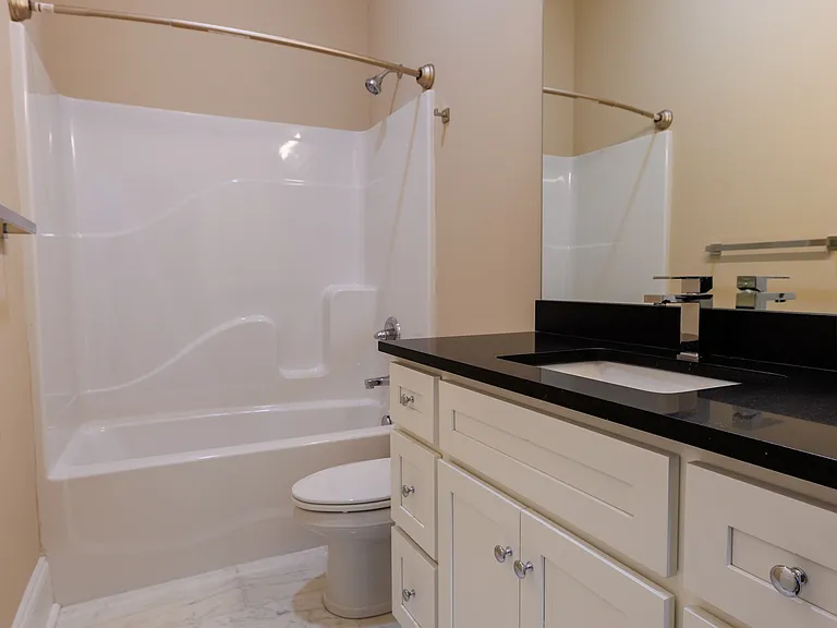 Brand new marble floors, custom cabinets, with granite counters.
