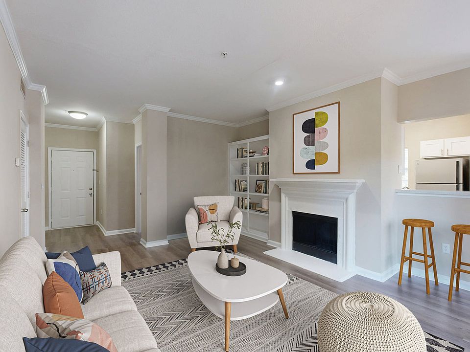 Cozy living room with fireplace and built-in bookcase