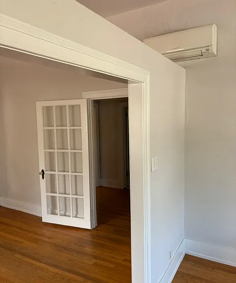 From Living Room & Dinning Room into Hallway/ Front Entrance