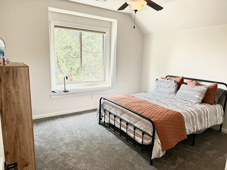 Queen bedroom with attached bathroom.