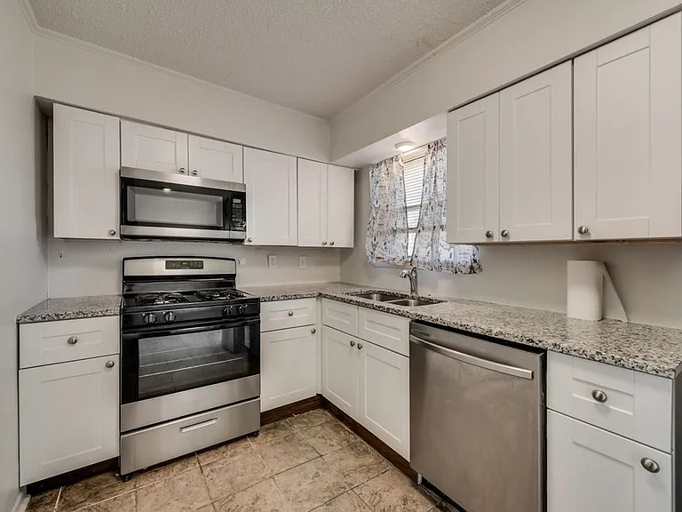 7704 Woodspan Dr — Photo 3