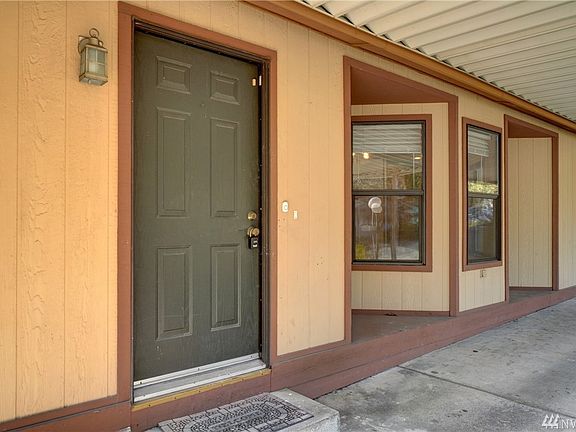 Convenient side entrance from carport. 