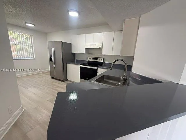 3 bed, 1166 sqft, $2,390 — Photo 1