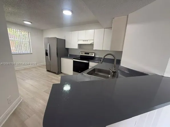 8721 Wiles Rd, Pompano Beach, FL
