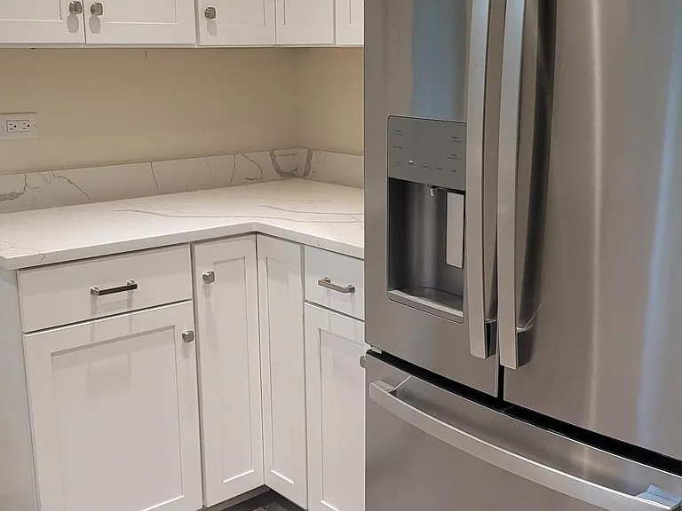 Partial Kitchen view with self-closing doors/drawers