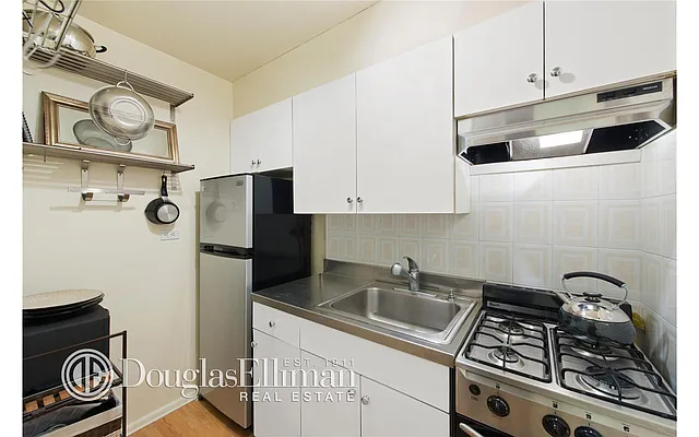 Sold by Douglas Elliman | media 12