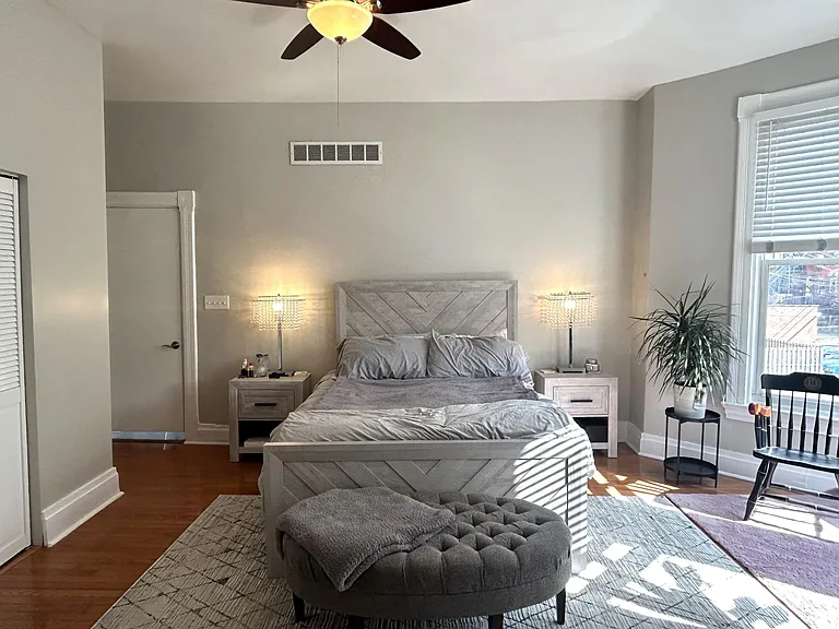 Huge Bedroom (Stairs lead straight into bedroom. 
High ceilings, ceiling fan, massive closet. Attached full bathroom.