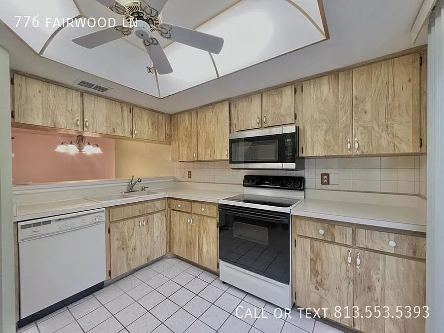 50% on First Month's Rent | Peaceful Clearwater Living: 2BR Home with Garage & Outdoor Space — Photo 2