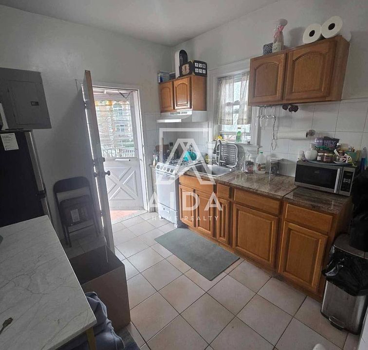 1st image of 2056 49th St #2