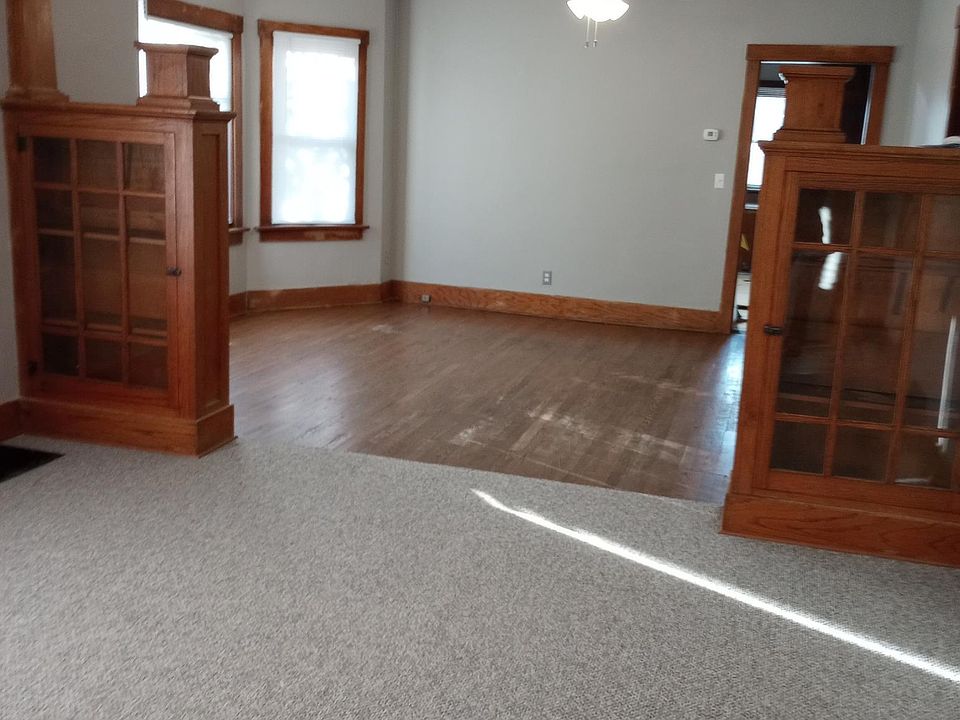 view from front door of living room and formal dining room