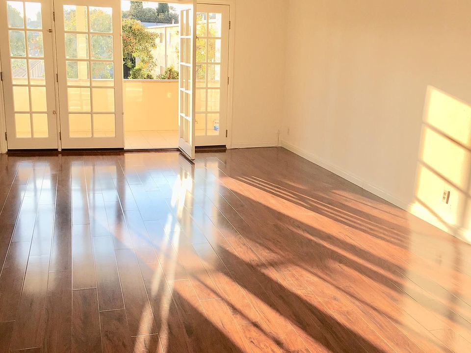 Bright hardwood living space with tons of natural light!