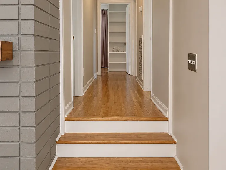 Hallway leading to bedrooms and bathrooms