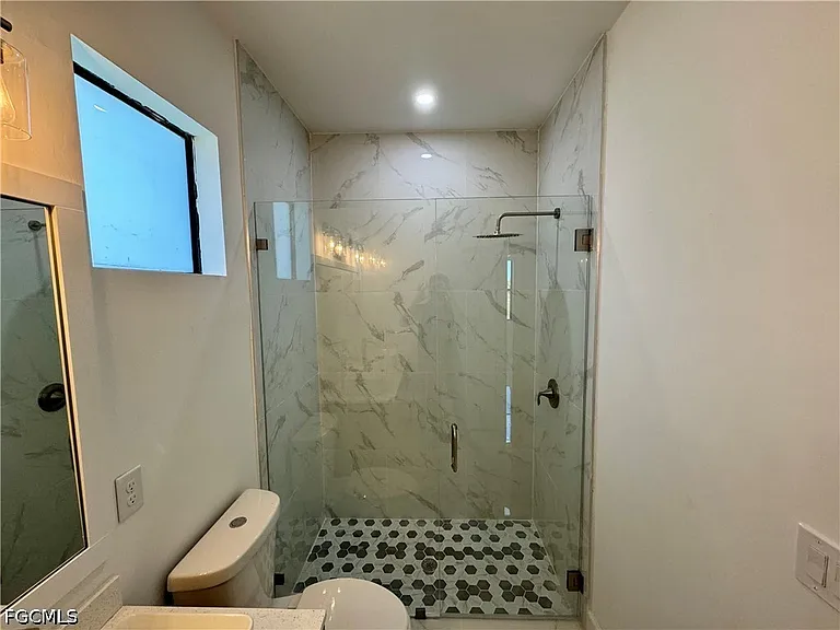 1208 NW 25th Pl — Photo 12