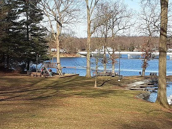 Private lakefront park in neighborhood - playground/ beach area