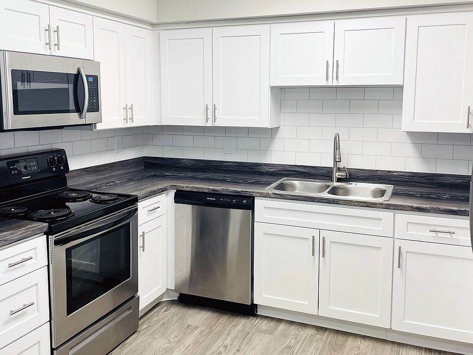 Experience kitchens with shining stainless-steel appliances and glimmering white subway tile backsplash - for a touch of modern elegance in all floor plans.