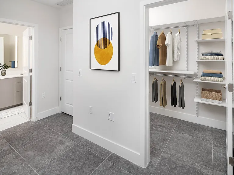 Signature Collection Townhome bedroom with walk-in closet