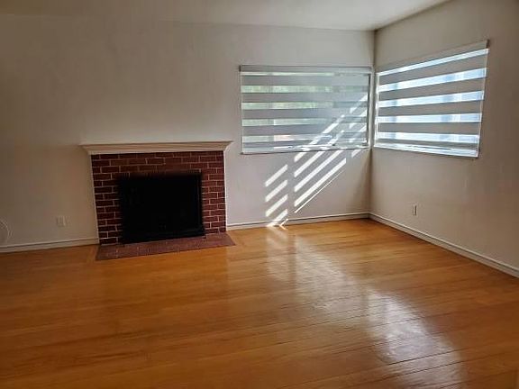 Living Room - Fireplace - Latest Windows Blinds