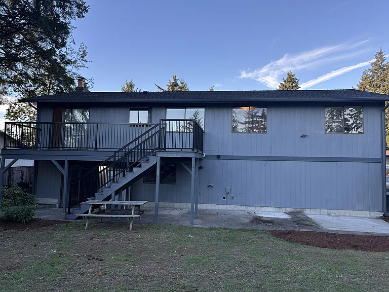 Full view of back of house which benefits from a southern exposure for those bright sunny days