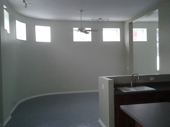 Living room area, some kitchen