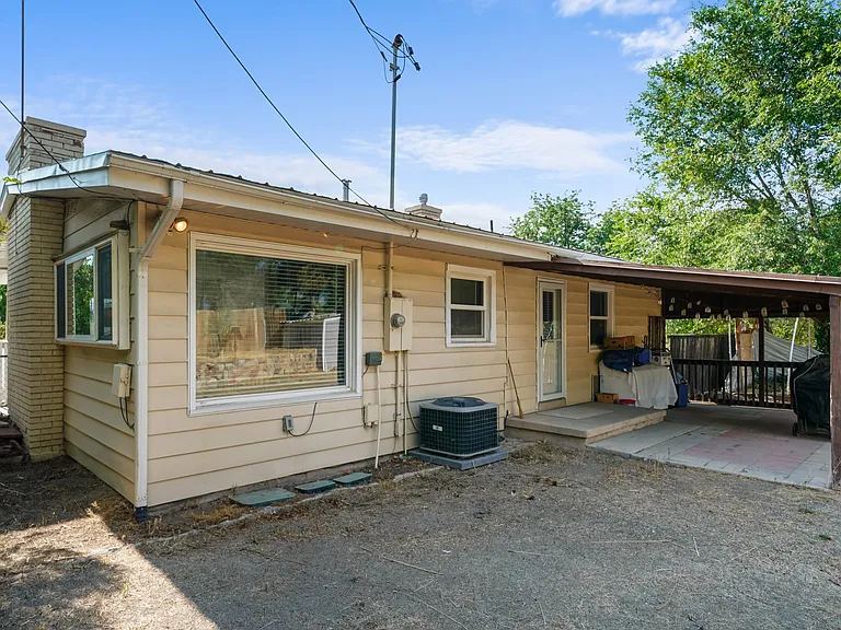 Back yard area with covered patio