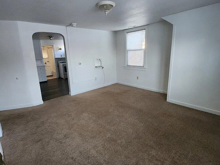 Living room looking at kitchen doorway