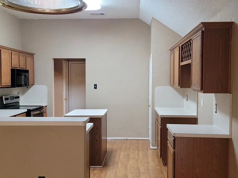 Looking into kitchen from breakfast nook