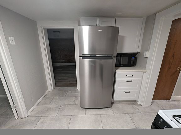 5th image of 1134 N Downing St APT 3