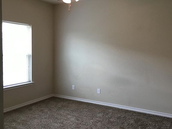 The master has plenty of natural light.