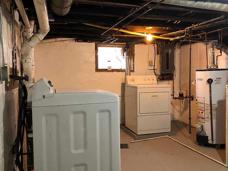 Basement includes washer and dryer