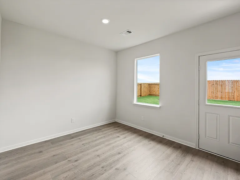 The dining room has a large window.