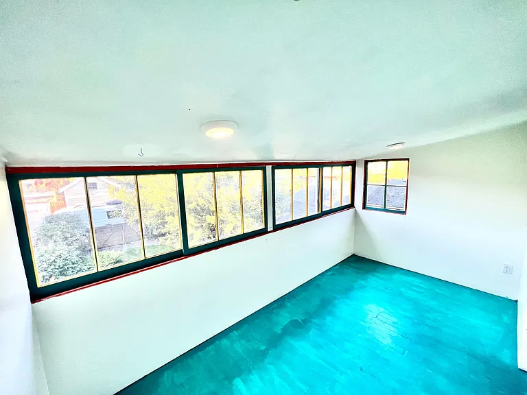 sunroom off of third bedroom