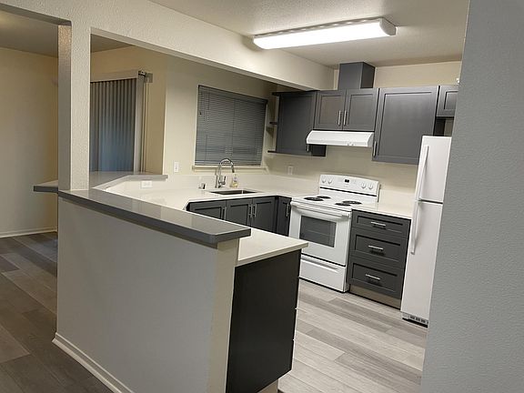 Newly renovated kitchen with sandstone countertops and 1 year old appliances.
